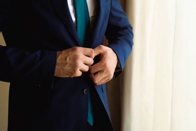 Man's style. dressing suit, shirt and cuffs