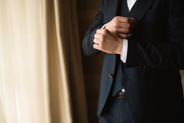 Man's style. dressing suit, shirt and cuffs