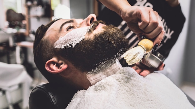 Man on shaving procedure