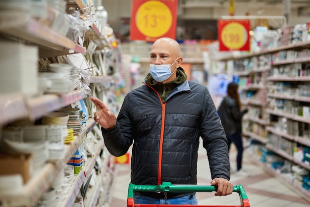 Man shopping in a supermarket