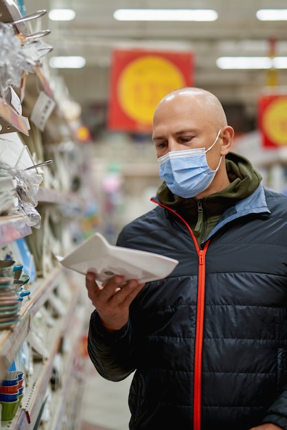 Man shopping in a supermarket