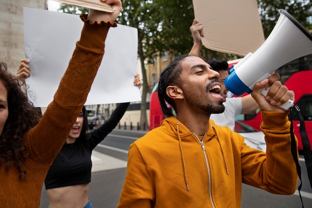 Man shouting into a megaphone close up