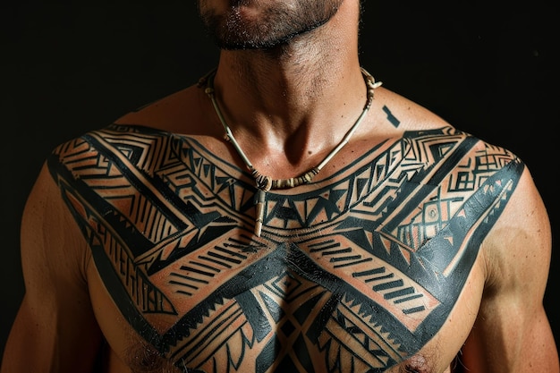 A man showcasing intricate tribalinspired tattoos on his chest A tribalinspired pattern on the chest