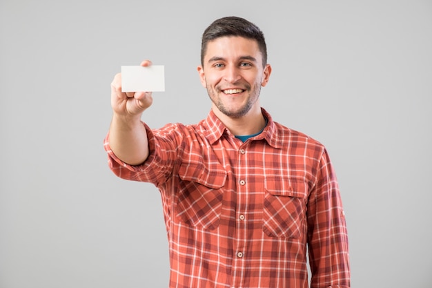 Man showing blank business card