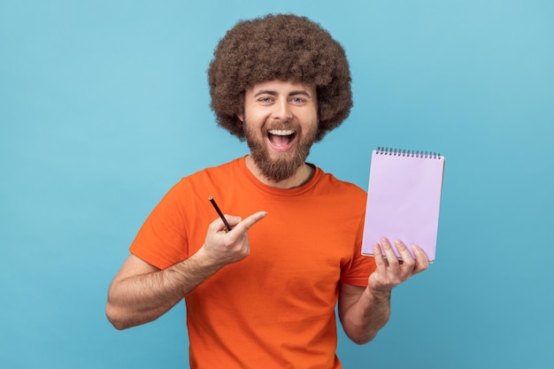 Man showing empty paper page template mock up for creative idea advertising text