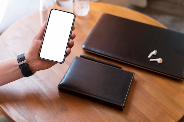 Man showing an empty screen phone