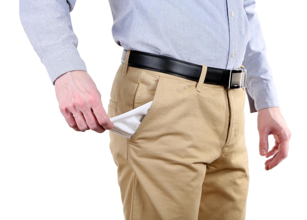 Man showing his empty pocket isolated on white