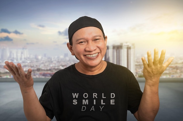 Man showing smile expression Happy smile face World Smile Day concept