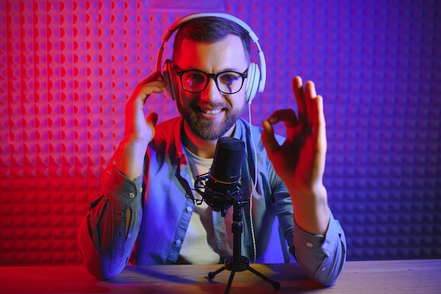 Man singing in a recording studio