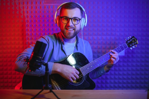 Man singing in a recording studio