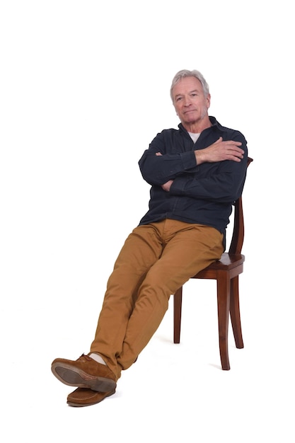 Man sitting on chair relaxed on white background