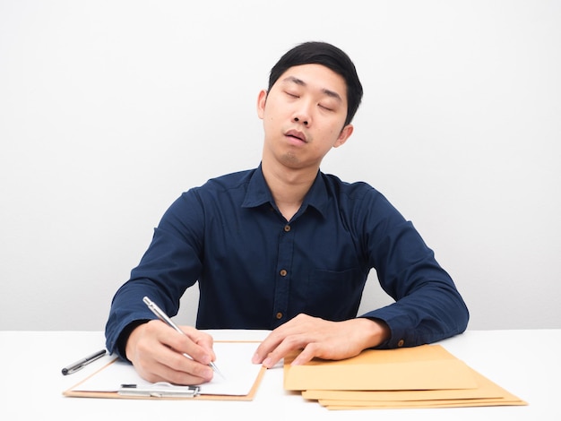 Man sleep with document envolope on the table