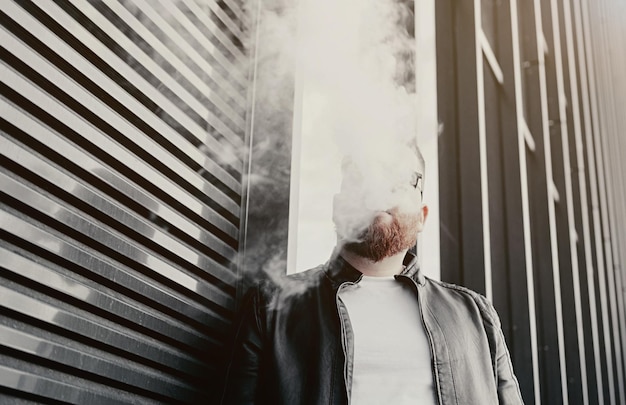 Man smokes an electronic cigarette