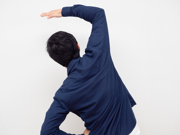 Man standing turn back gesture stretch lazily white background