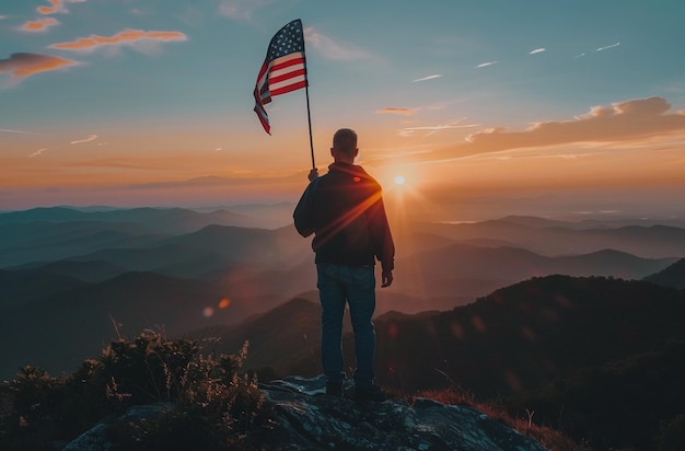 Photo a man stands on a mountain with a flag in the background