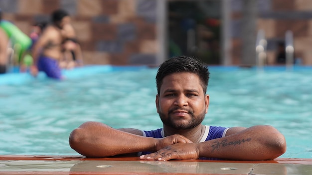 A man stands at pool side sonipat Haryana India 20 may 2023 sonipat Haryana India 20 may 2023