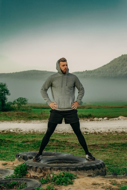 Man stretching before training