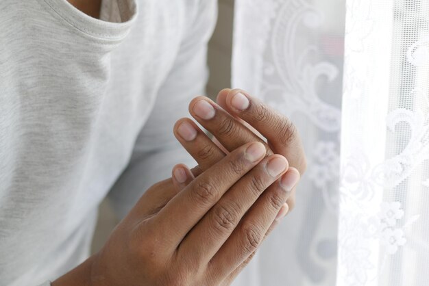 Man suffering pain in hand close up