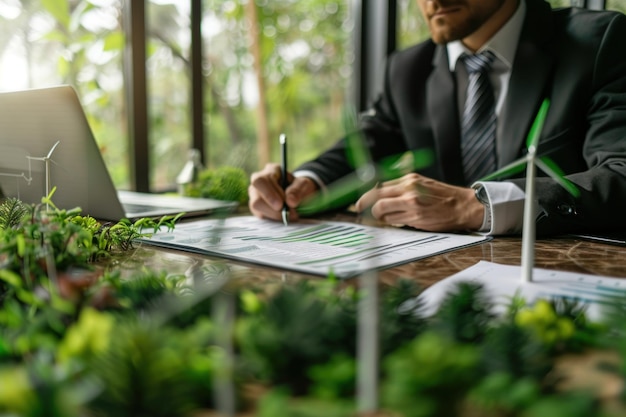 A man in a suit is writing on a piece of paper with a pen