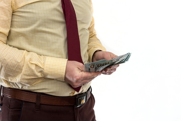 A man in a suit offers a bribe for a product or service