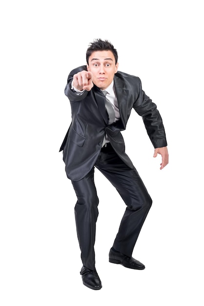 Man in suit pointing at camera