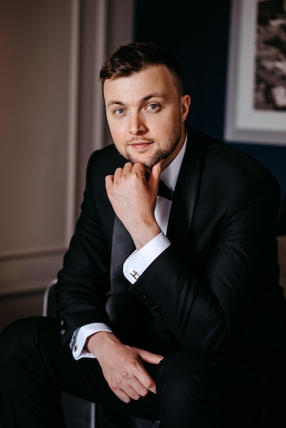 a man in a suit with a tie that says  st patrick