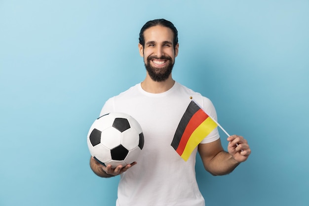 Man supporting german soccer team on championship cheering and greeting patriotism