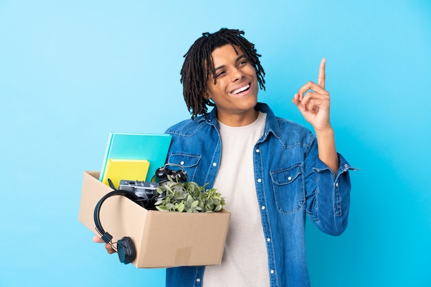 man taking a box full of things and making a move