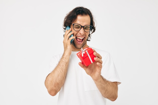 Man talking on the phone gift box isolated background