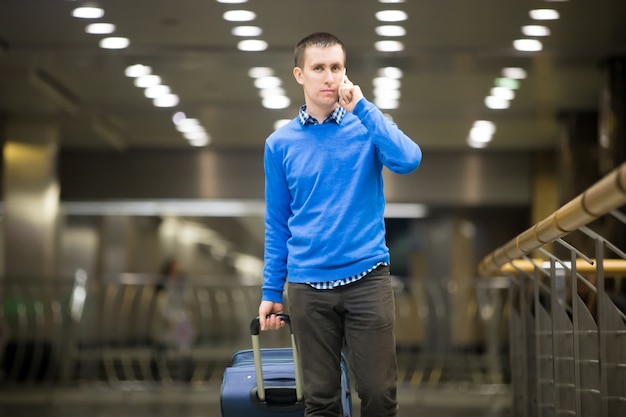 Man talking on the phone while walking