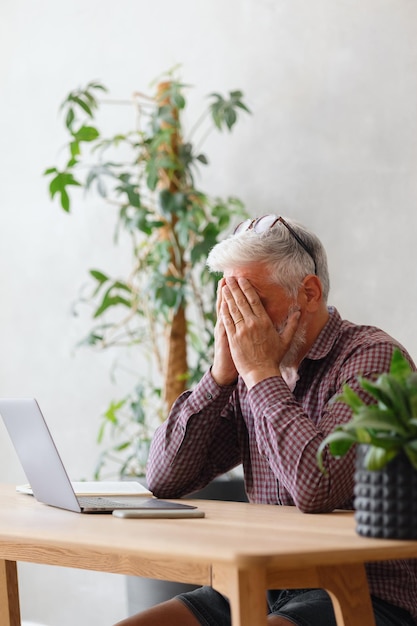 Man talks on the phone with colleagues or business partners solving financial and legal problems