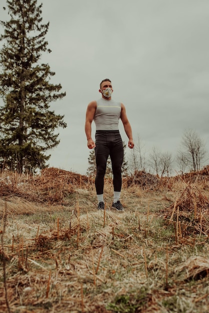 Man training with a mask due to the corona virus