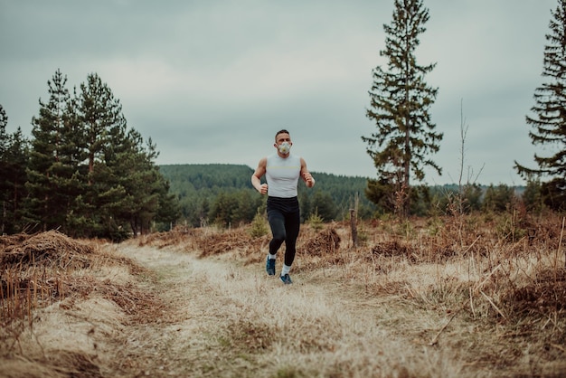 Man training with a mask due to the corona virus