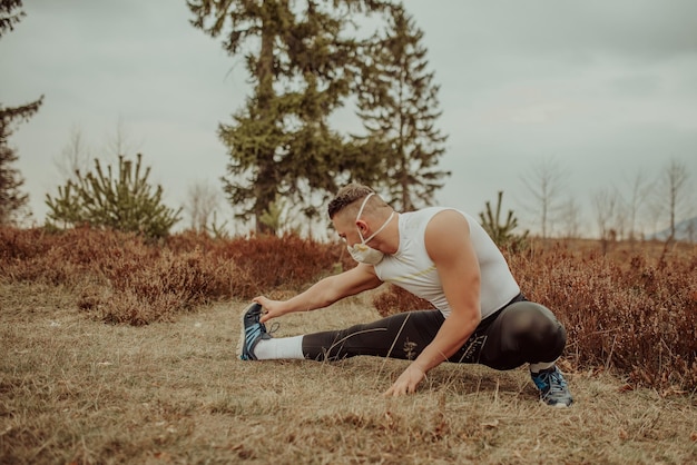 Man training with a mask due to the corona virus