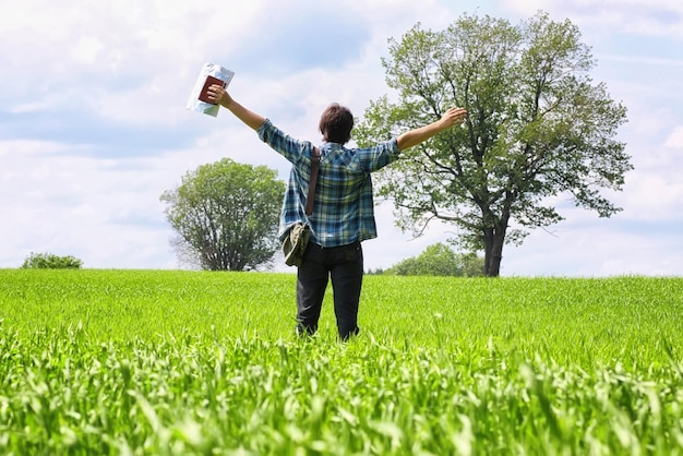 Man travel in field summer