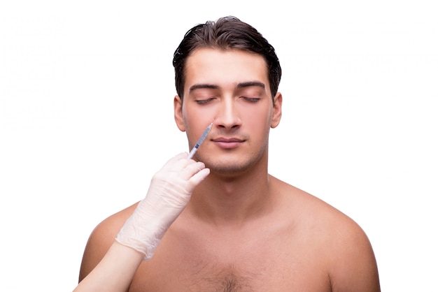 Man undergoing plastic surgery isolated on white