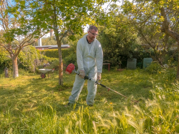 Man using brush cutter