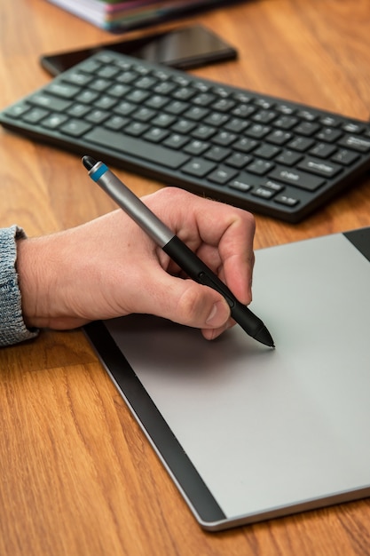 Man during using a graphic tablet