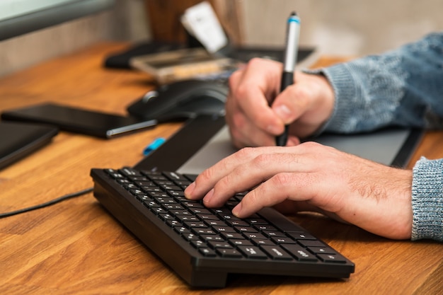 Man during using a graphic tablet