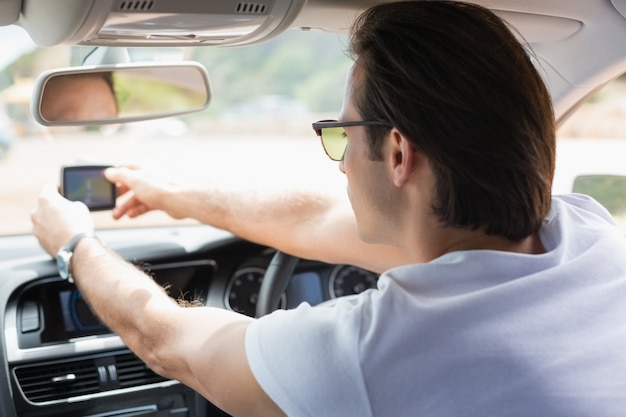 Man using satellite navigation system