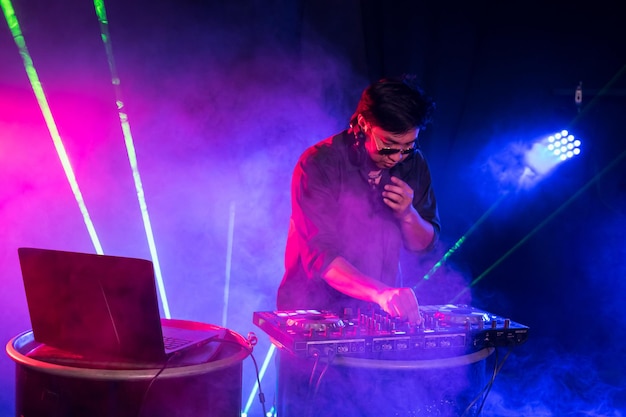 Photo man using sound mixer at nightclub