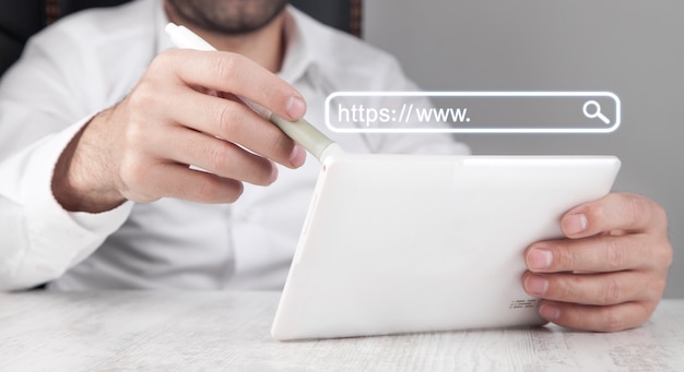 Man using white digital tablet