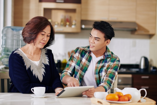 Man visiting mother at home