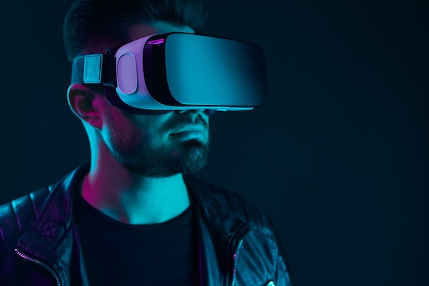 Man in vr goggles experiencing virtual world