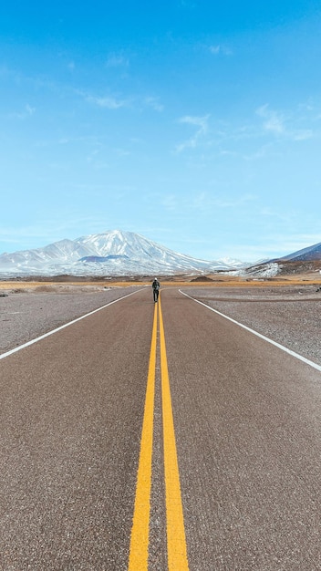 Man walking along the Seismiles Route in Catamarca, Argentina