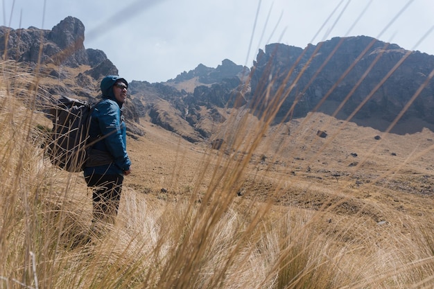 Man walking in mountain landscape