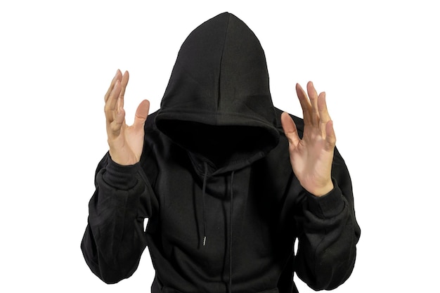 Man wearing black hoodie on white background hacker data thievesraise your hand in surrender