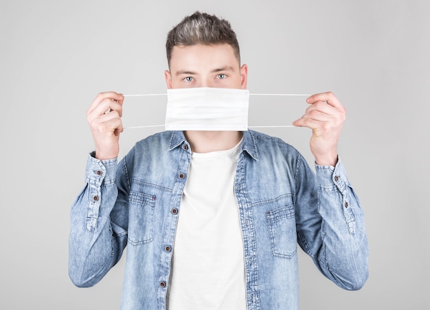 A man wears an anti-virus mask to prevent others from contracting the coronavirus COVID-19