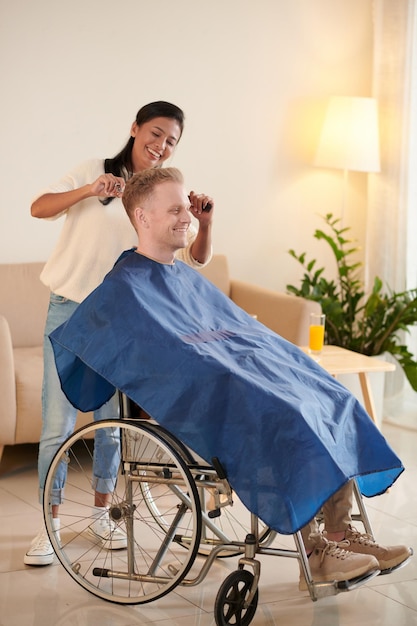 Man in Wheelchair Getting Haircut