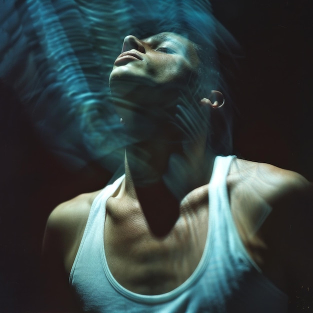 Photo man in white tank top with dramatic lighting and motion blur this image can be used for creative projects emphasizing emotion and dynamic movement stunning lights and artistic style ai